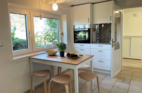 Fahretoft House | "Experience Relaxation and Adventure at Ferienhaus Haus Nordwind 1849!"