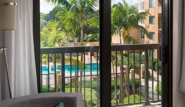2 Inviting Suites Perfect for Families, Heated Pool & On-Site Market Convenience in Boca Raton