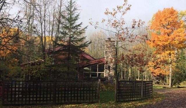 Custom Built Home Neslted in the Woods in La Pointe
