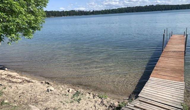 Enjoy a relaxing vacation with views and access to two lakes in Akeley