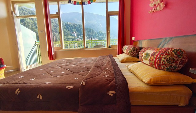 Golden View BnB Mcleodganj Room with private balcony facing mountain view. in Dharamshala