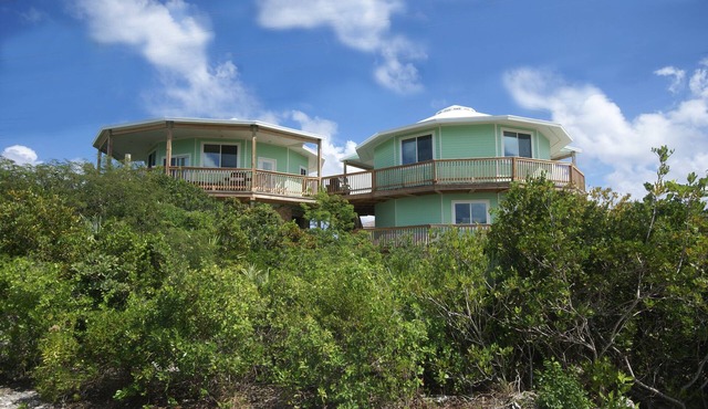 Layin' Low includes one golf cart/villa with water views in Staniel Cay
