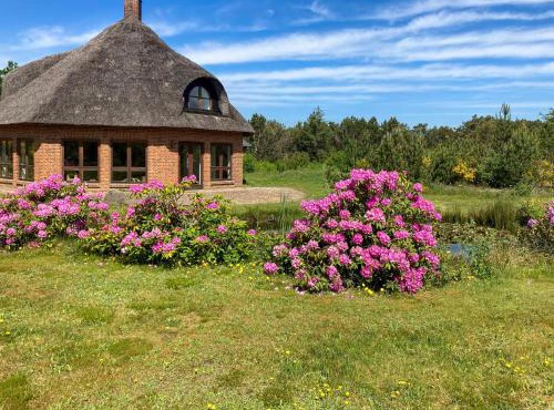 Octagonal Thatched Forest House Near Herning in Videbæk