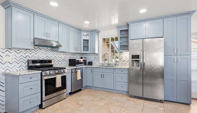 Spacious, single-level home with a large yard, gas fireplace, & washer/dryer in Goleta