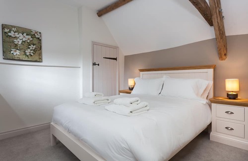 Guiting Power Cottage | The Nook boasts pretty views over the stunning Cotswolds rooftops in the village of Guiting Power